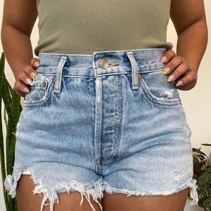 Brand Agolde. Light Was Jean Shorts with rip hem.